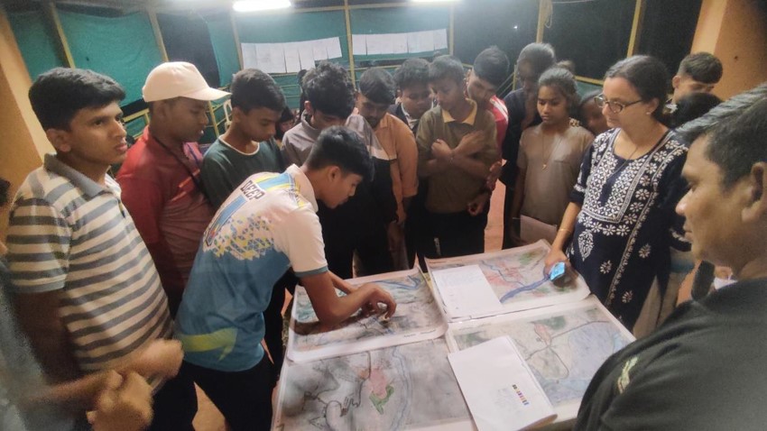 Youth Reviewing Maps